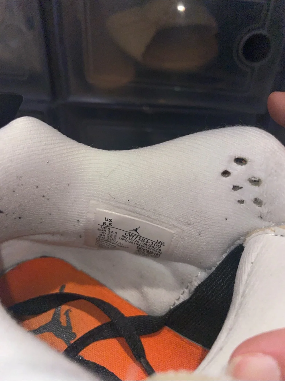Jordan Black and Orange Low-Top Sneakers
